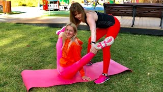 Extra Middle Split! Pair stretching! 2 crazy girls at the park